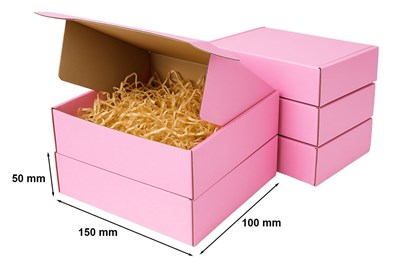 20 różowych pudełek wykrojnikowych, część złożona, część rozłożona.